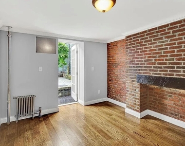 118 EAST 7TH STREET - Photo Thumbnail 1