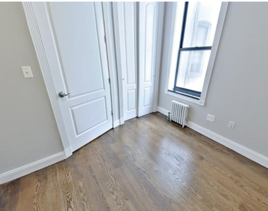 East 100th Street - Photo Thumbnail 2