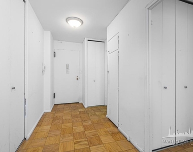 E 46th St - Photo Thumbnail 4