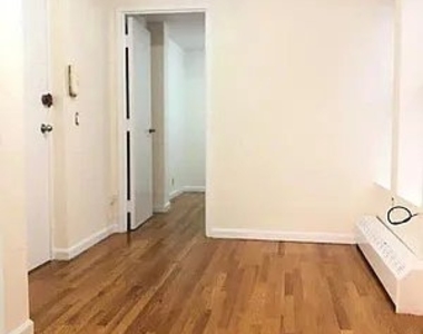 516 E 80th St - Photo Thumbnail 1