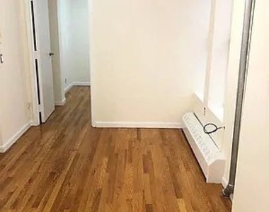 516 E 80th St - Photo Thumbnail 3