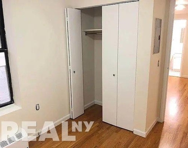 516 E 80th St - Photo Thumbnail 2