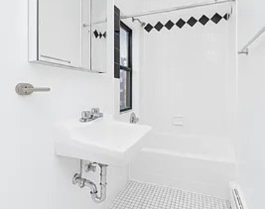 516 E 80th St - Photo Thumbnail 4