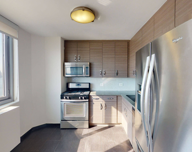 401 E 34th St - Photo Thumbnail 2