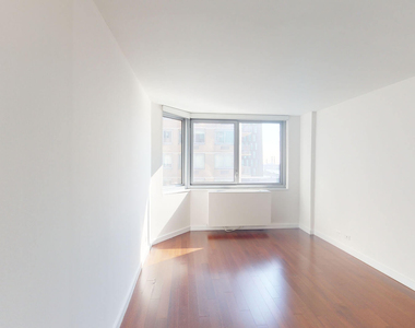 401 E 34th St - Photo Thumbnail 3