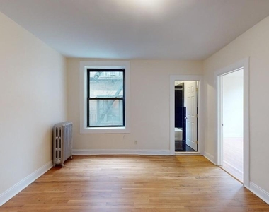 207-209 W 11th Street - Photo Thumbnail 0