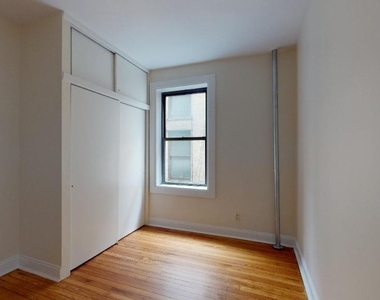 207-209 W 11th Street - Photo Thumbnail 4