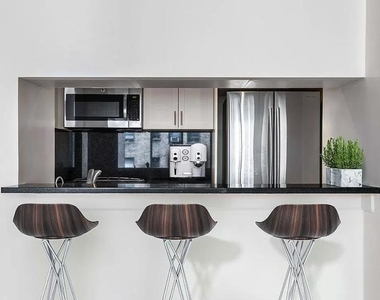 East 56th Street - Photo Thumbnail 3