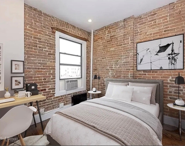 244 W 22nd St - Photo Thumbnail 3