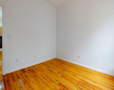 214 East 10th Street - Photo Thumbnail 6