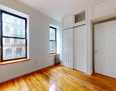 214 East 10th Street - Photo Thumbnail 4