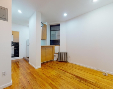 214 East 10th Street - Photo Thumbnail 0
