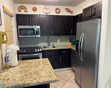 909 Ne 23rd Dr - Photo Thumbnail 6