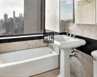E. 39th Street - Photo Thumbnail 3