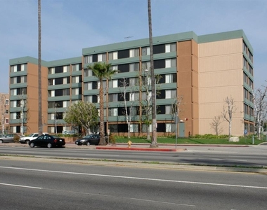 15211 Sherman Wy - Photo Thumbnail 3
