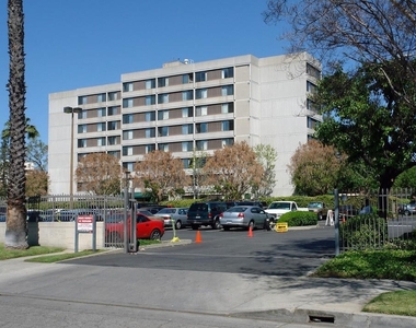 14650 Sherman Wy - Photo Thumbnail 1