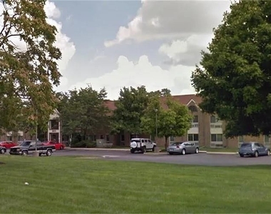 1801 N Broadway Ave - Photo Thumbnail 1