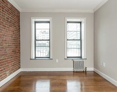 334 East 100th Street - Photo Thumbnail 2