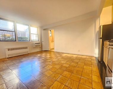 East 36 Street - Photo Thumbnail 0