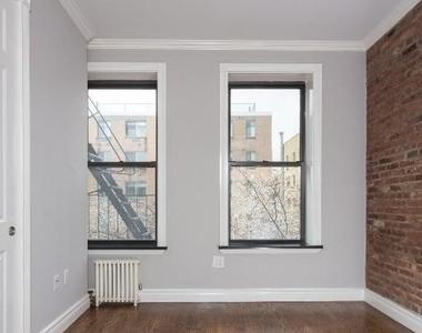 309 East 8th Street - Photo Thumbnail 0