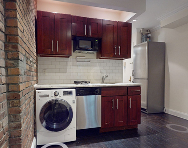 610 East 9th Street - Photo Thumbnail 2