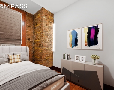 150 E 3rd Street - Photo Thumbnail 3