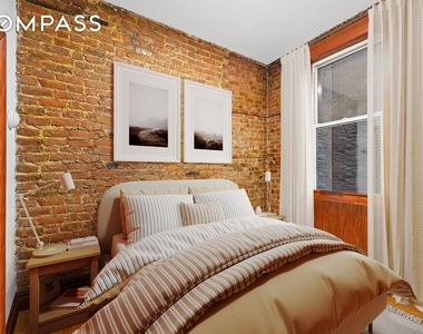 150 E 3rd Street - Photo Thumbnail 2