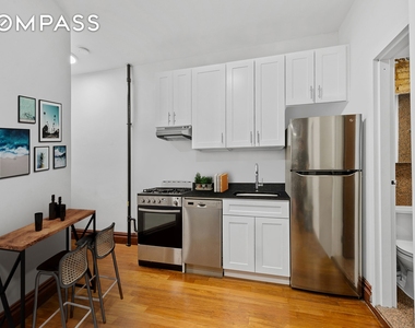 150 E 3rd Street - Photo Thumbnail 0