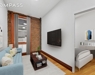 150 E 3rd Street - Photo Thumbnail 1