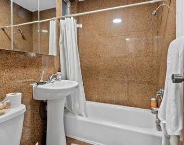 150 E 3rd Street - Photo Thumbnail 4