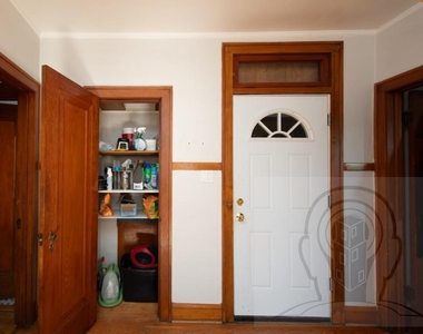 5057 West Newport Avenue - Photo Thumbnail 5