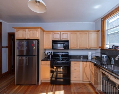 5057 West Newport Avenue - Photo Thumbnail 2