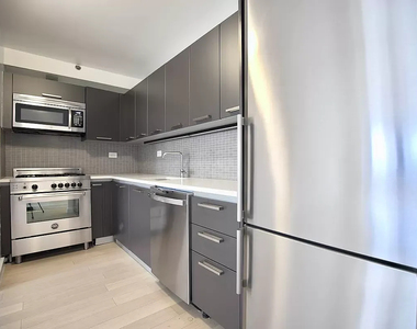 East 39th St - Photo Thumbnail 5