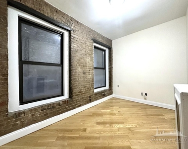E 12th St / 3rd Ave - Photo Thumbnail 3