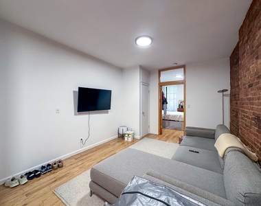215 East 5th Street - Photo Thumbnail 3
