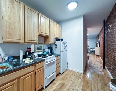 215 East 5th Street - Photo Thumbnail 7