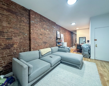 215 East 5th Street - Photo Thumbnail 4