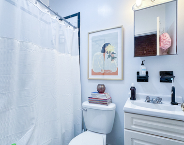 215 East 5th Street - Photo Thumbnail 6