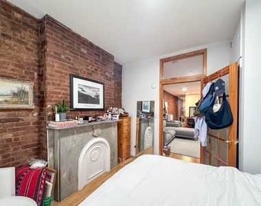 215 East 5th Street - Photo Thumbnail 2