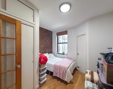 215 East 5th Street - Photo Thumbnail 10