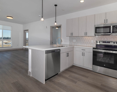 9345 E 56th Ave - Photo Thumbnail 3