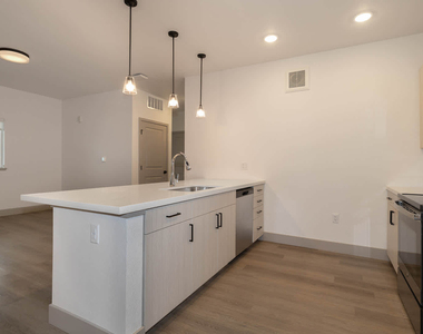 9345 E 56th Ave - Photo Thumbnail 2