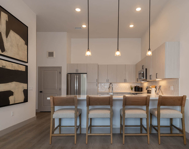 9345 E 56th Ave - Photo Thumbnail 1