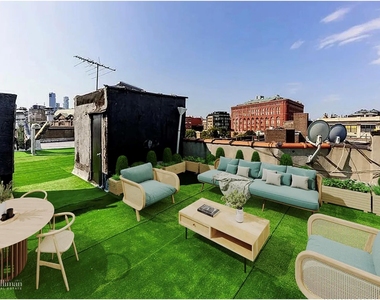 244 W 22nd St - Photo Thumbnail 2
