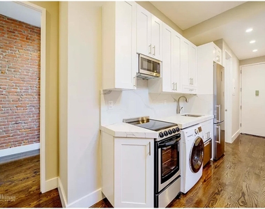 244 W 22nd St - Photo Thumbnail 1