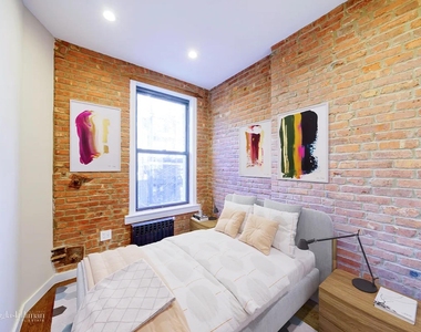 244 W 22nd St - Photo Thumbnail 5