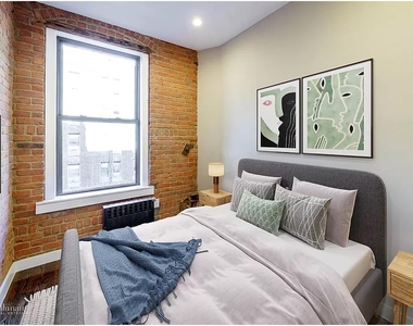 244 W 22nd St - Photo Thumbnail 7