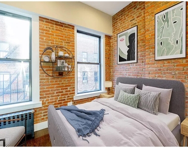 244 W 22nd St - Photo Thumbnail 3