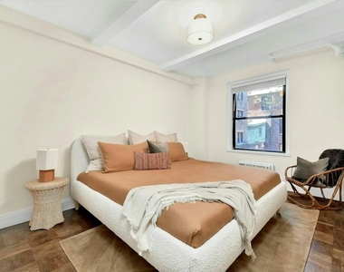 226 E 12th Street - Photo Thumbnail 2