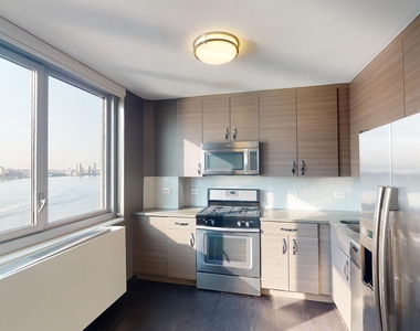 401 E 34th St - Photo Thumbnail 1